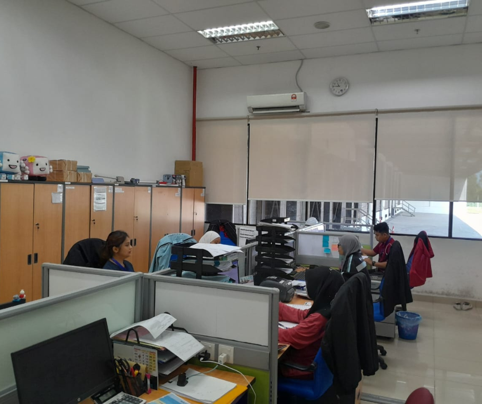 Employees are working in the office.